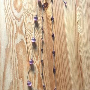 Lia Sophia purple necklace with 3 layers.